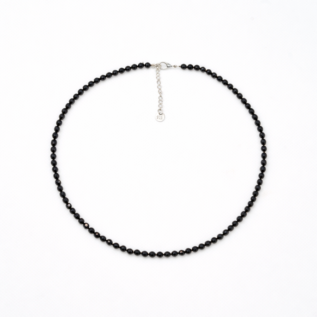 Beaded Black Tourmaline Crystal Necklace on white background