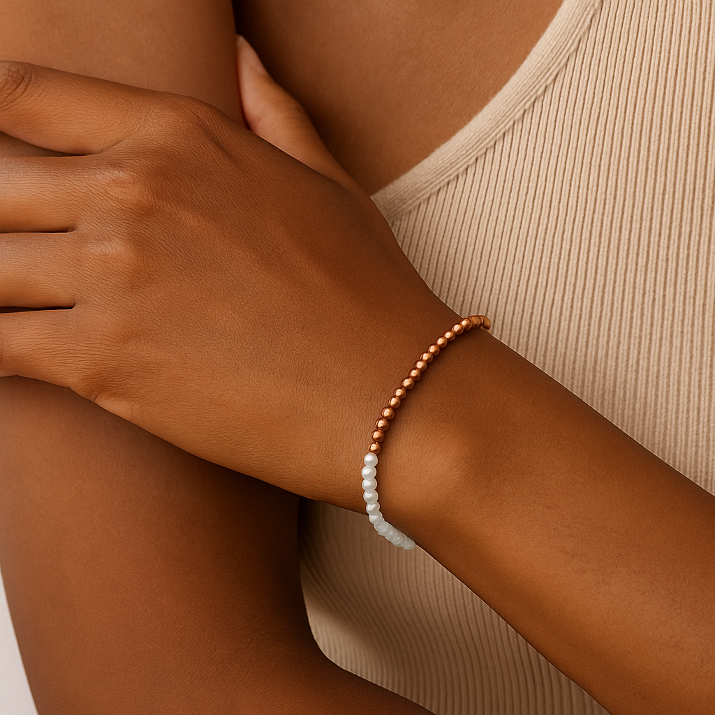 Aquamarine facetd beaded bracelet on a wrist with a natural background