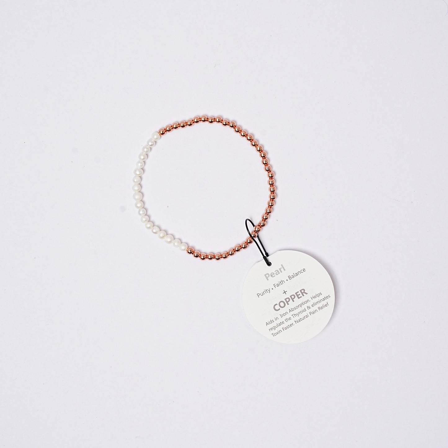 bracelet copper with faceted beads, tag on a white background
