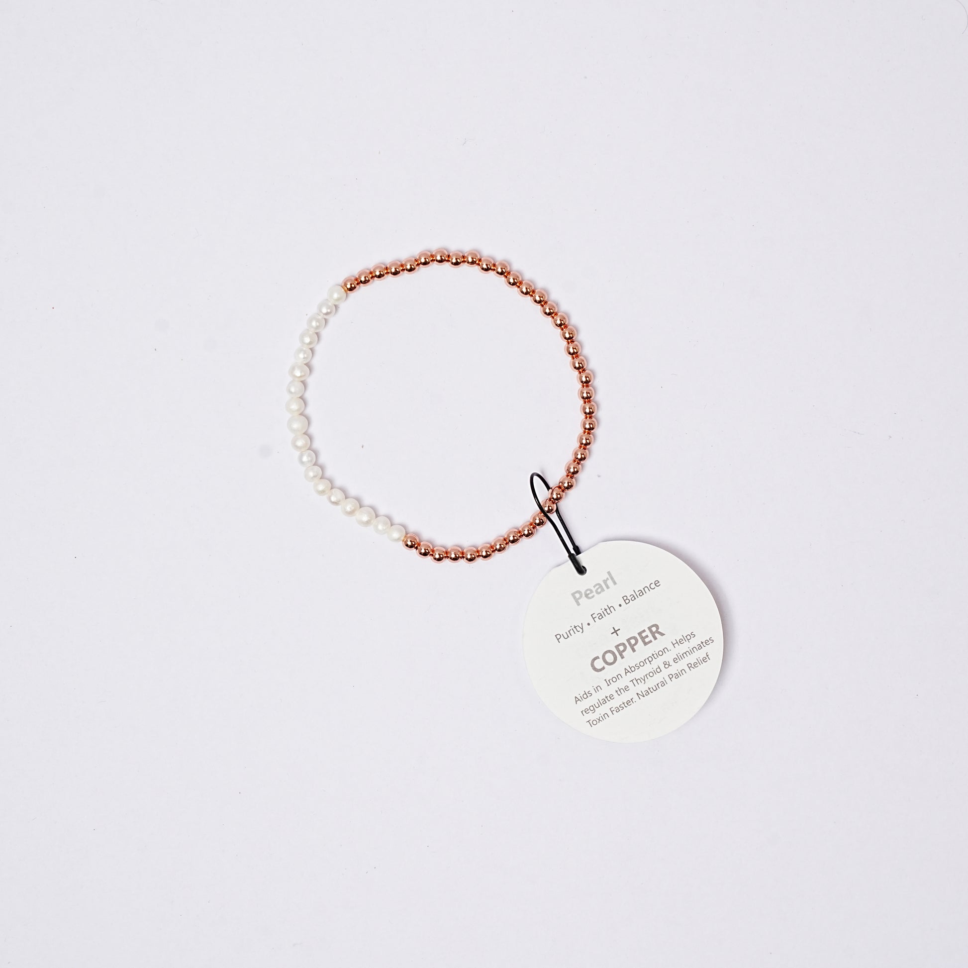 bracelet copper with faceted beads, tag on a white background